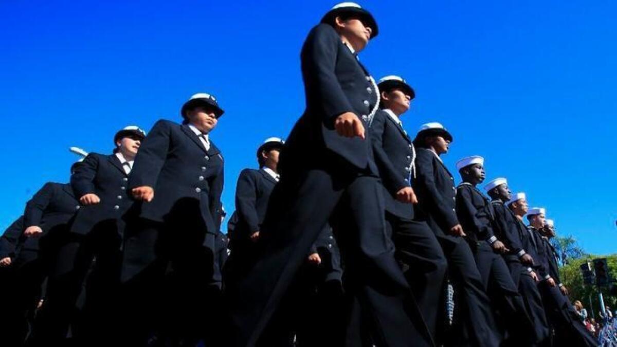 Sailors stationed in San Diego took part in the 2015 Veterans Day parade along Harbor Drive.