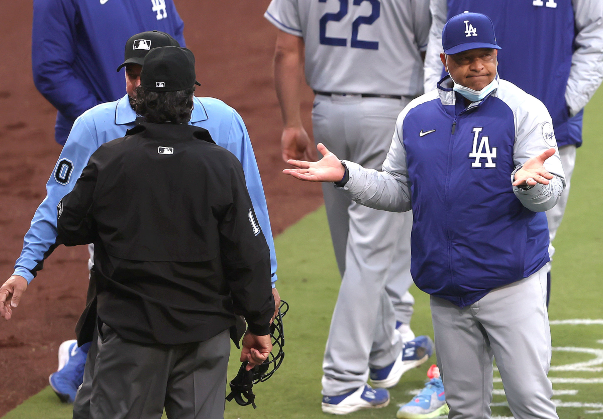Dodgers manager Dave Roberts reacts to a catchers interference call against the Dodgers during the fourth inning Saturday.
