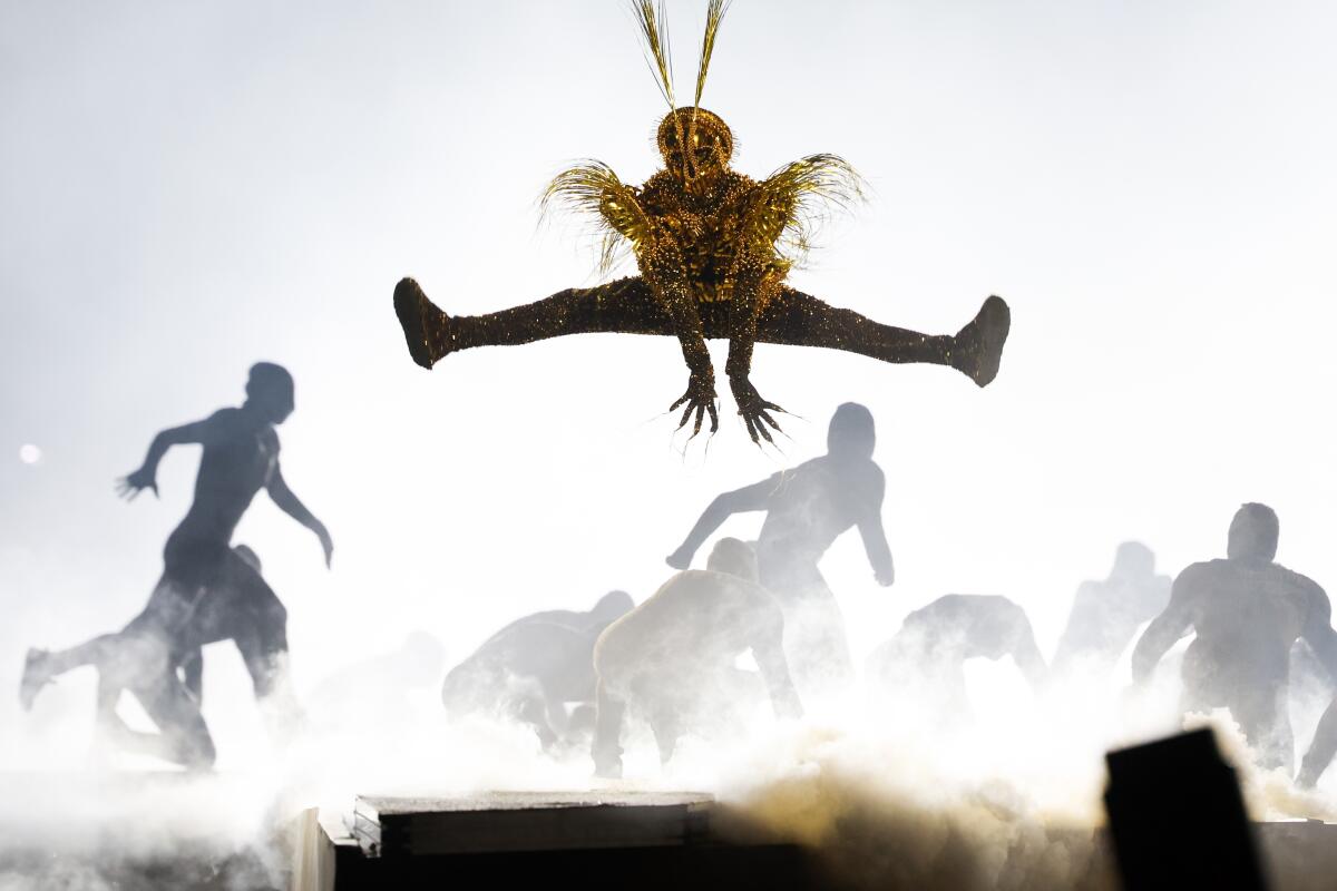 Artists perform during the closing ceremony of the 2024 Paris Olympics at Stade de France on Sunday.