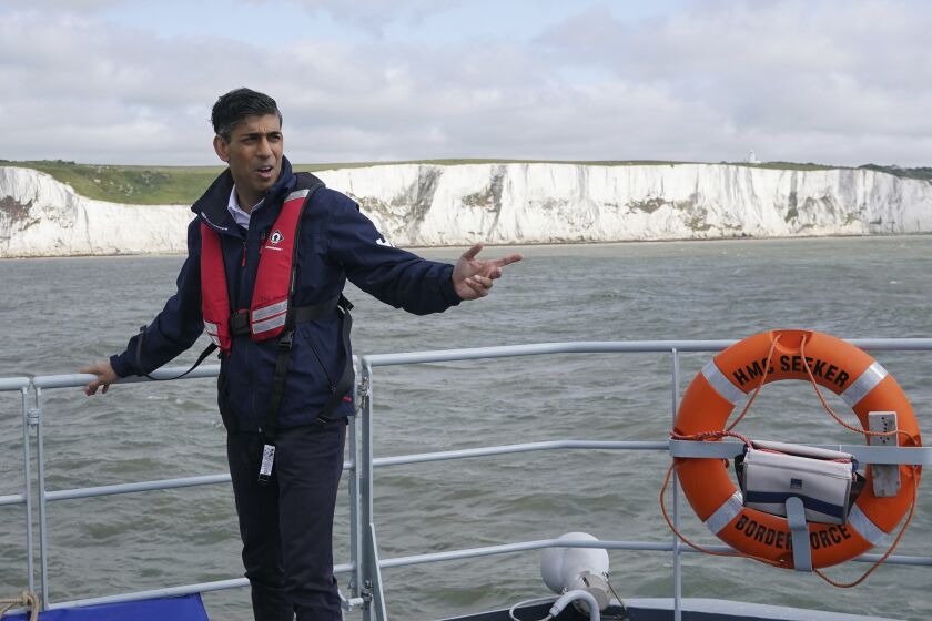 Britain's Prime Minister Rishi Sunak onboard Border Agency cutter HMC Seeker during a visit to Dover, England, Monday, June 5, 2023 ahead of a press conference to update the nation on the progress made in the six months since he introduced the Illegal Migration Bill under his plans to "stop the boats". (Yui Mok/Pool Photo via AP)