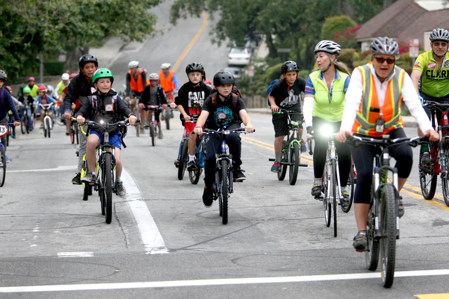 Verdugo Woodlands Elementary School students, parents and volunteers participate in Bike to School Day in Glendale on Wednesday, May 4, 2016. The ride began at the First Congregational Church and traveled south on Niodrara Dr. into Verdugo Park and finally into the back entrance to the school on Colina Drive.