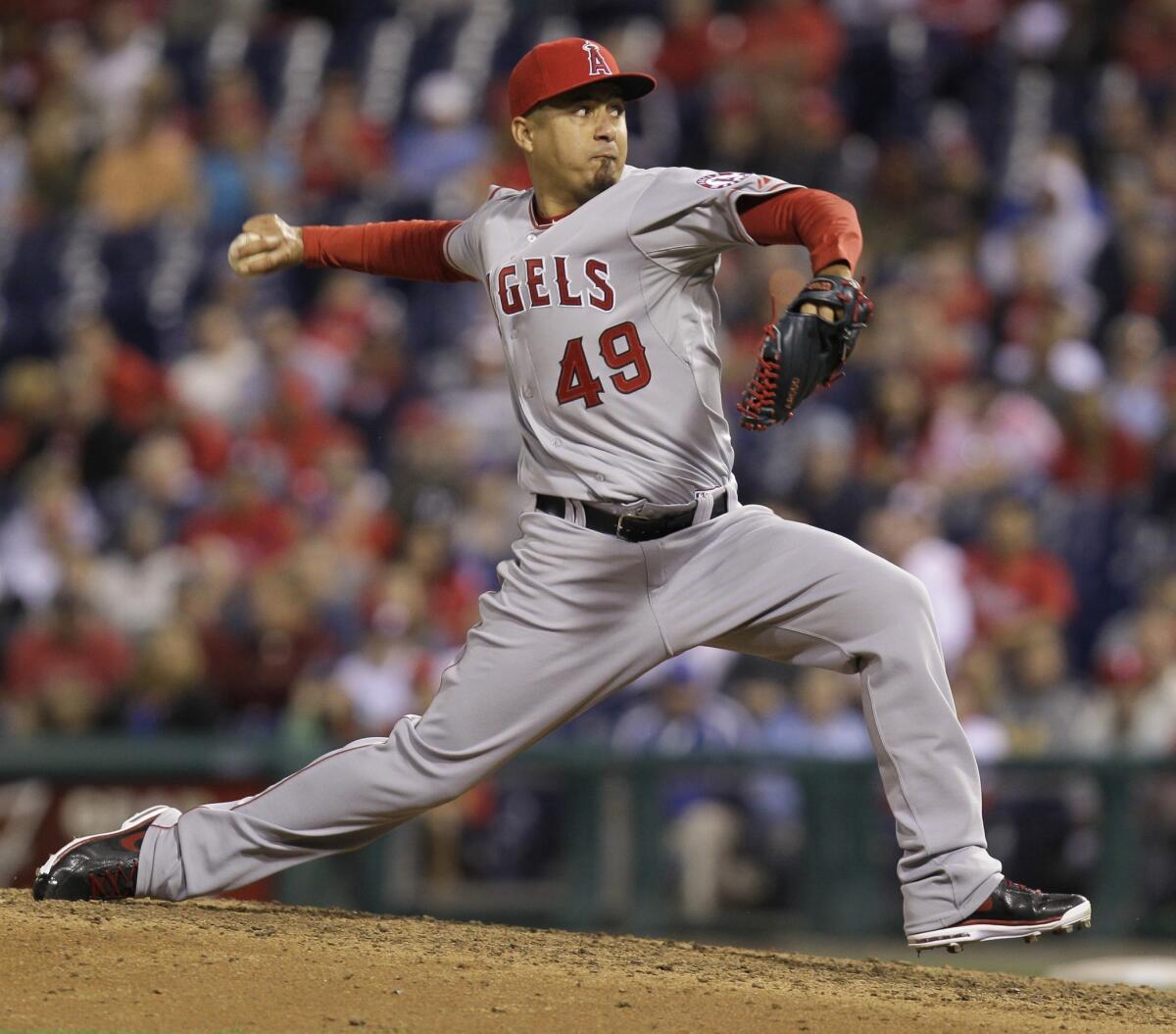 Ernesto Frieri pitches during the ninth inning of the Angels' 4-3 win over the Philadelphia Phillies on Tuesday at Citizens Bank Park.