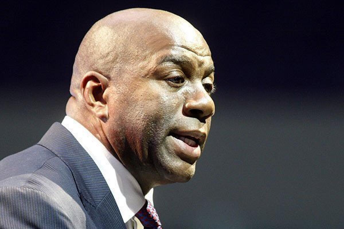 Magic Johnson says it will take a few months for the reformulated Lakers to begin hitting on all cylinders, probably after the All-Star break.