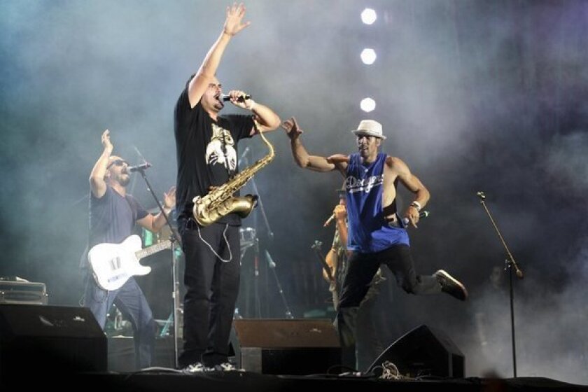 The Los Angeles-based band Ozomatli performs during the Cumbre Tajin 2013 music festival in Papantla, Mexico.