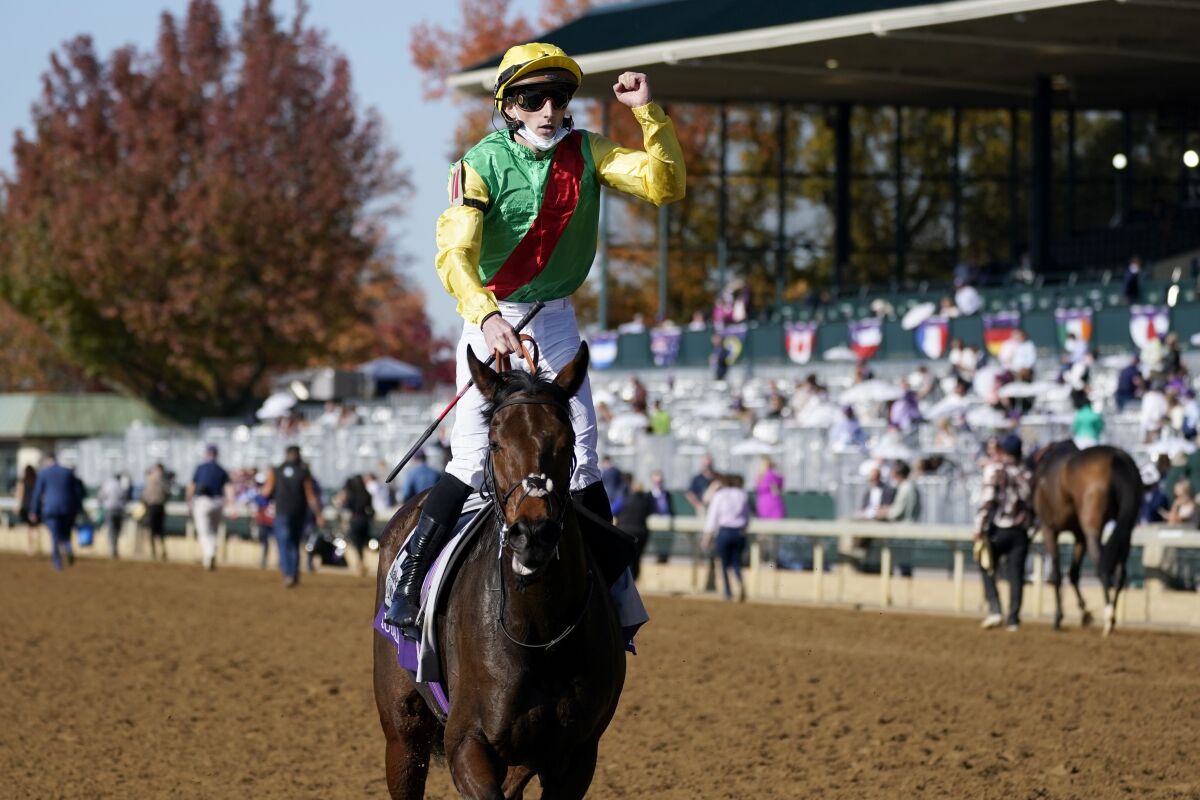 Pierre-Charles Boudot, celebrates atop Audarya after winning the Breeders' Cup Filly & Mare Turf horse race at Keeneland Race Course, in Lexington, Ky., Saturday, Nov. 7, 2020. (AP Photo/Darron Cummings)