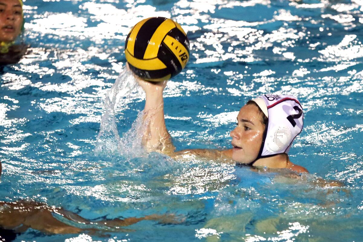 Mia Bernhoit (2) looks for a open player during CdM's victory on Wednesday.