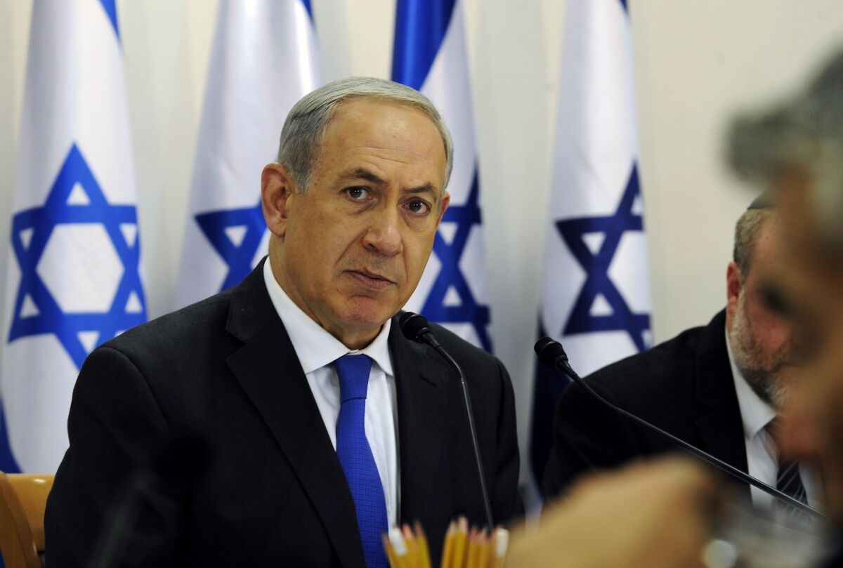 Israeli Prime Minister Benjamin Netanyahu looks on during a cabinet meeting. Netanyahu said that Israel would do all it could to keep world powers from striking a "bad and dangerous" deal with Iran over its nuclear program.