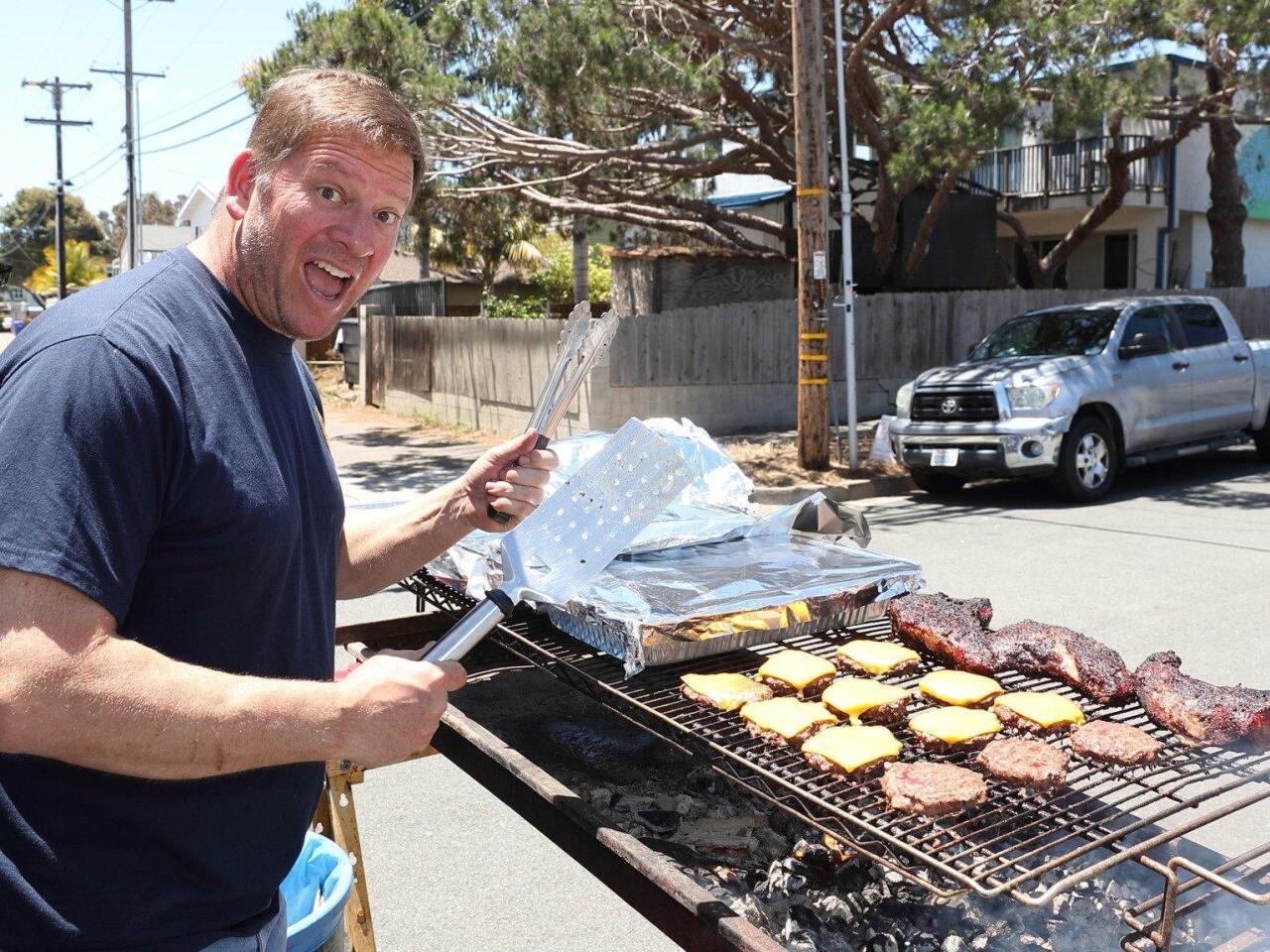 Boomer Schilling mans the BBQ at the Encinitas American Legion Memorial Day event