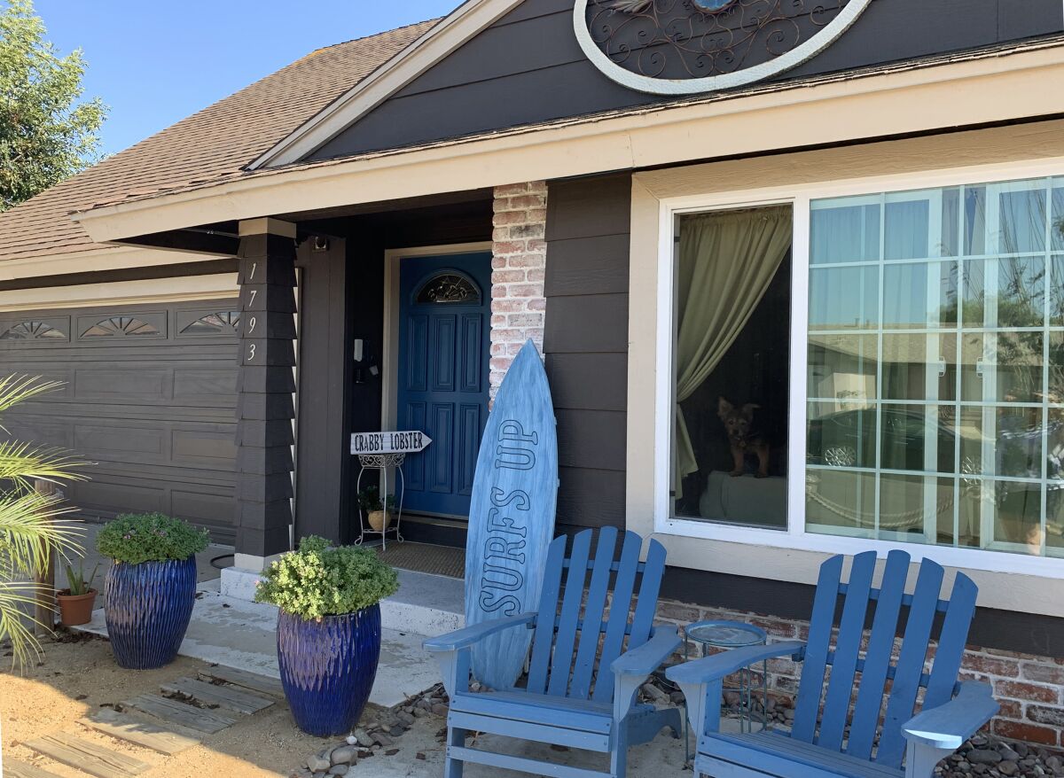 Ideas from Pinterest helped fill out Stephenson's beachfront vision, with blue Adirondack chairs and a surfboard.