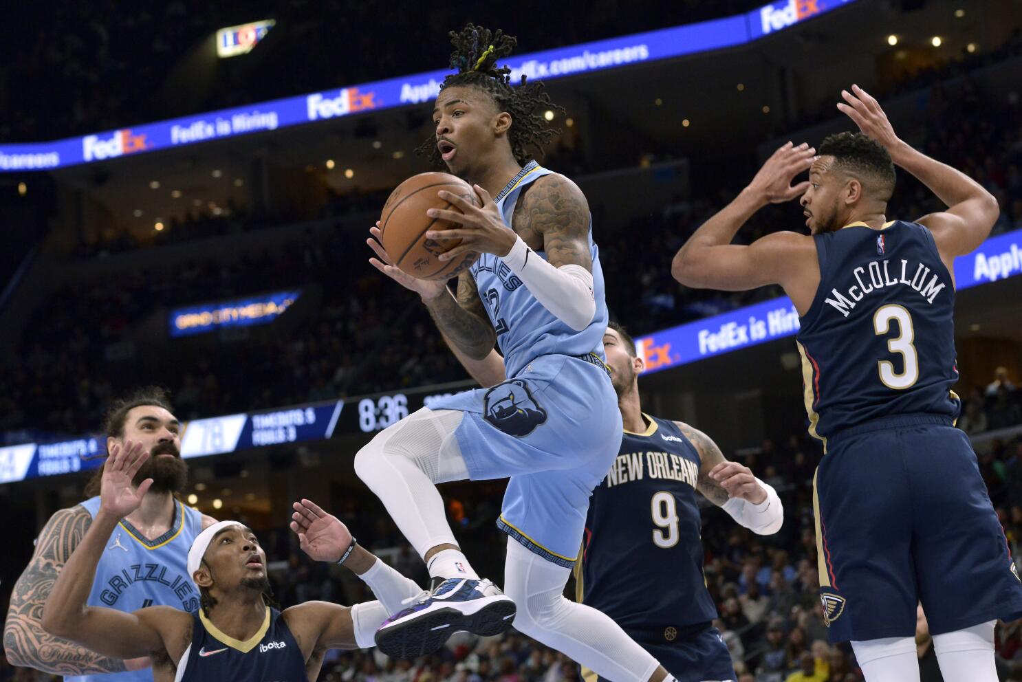 Ja Morant returns from knee injury, Grizzlies rout Pelicans