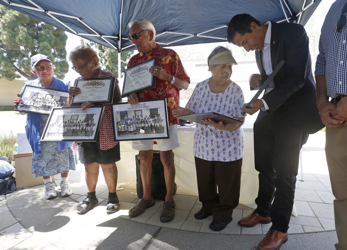 Former City Councilman Sergio Contreras stands with Dolores Ponce, Soccoro Perez, Frank Mendoza and Luisa Hernandez.