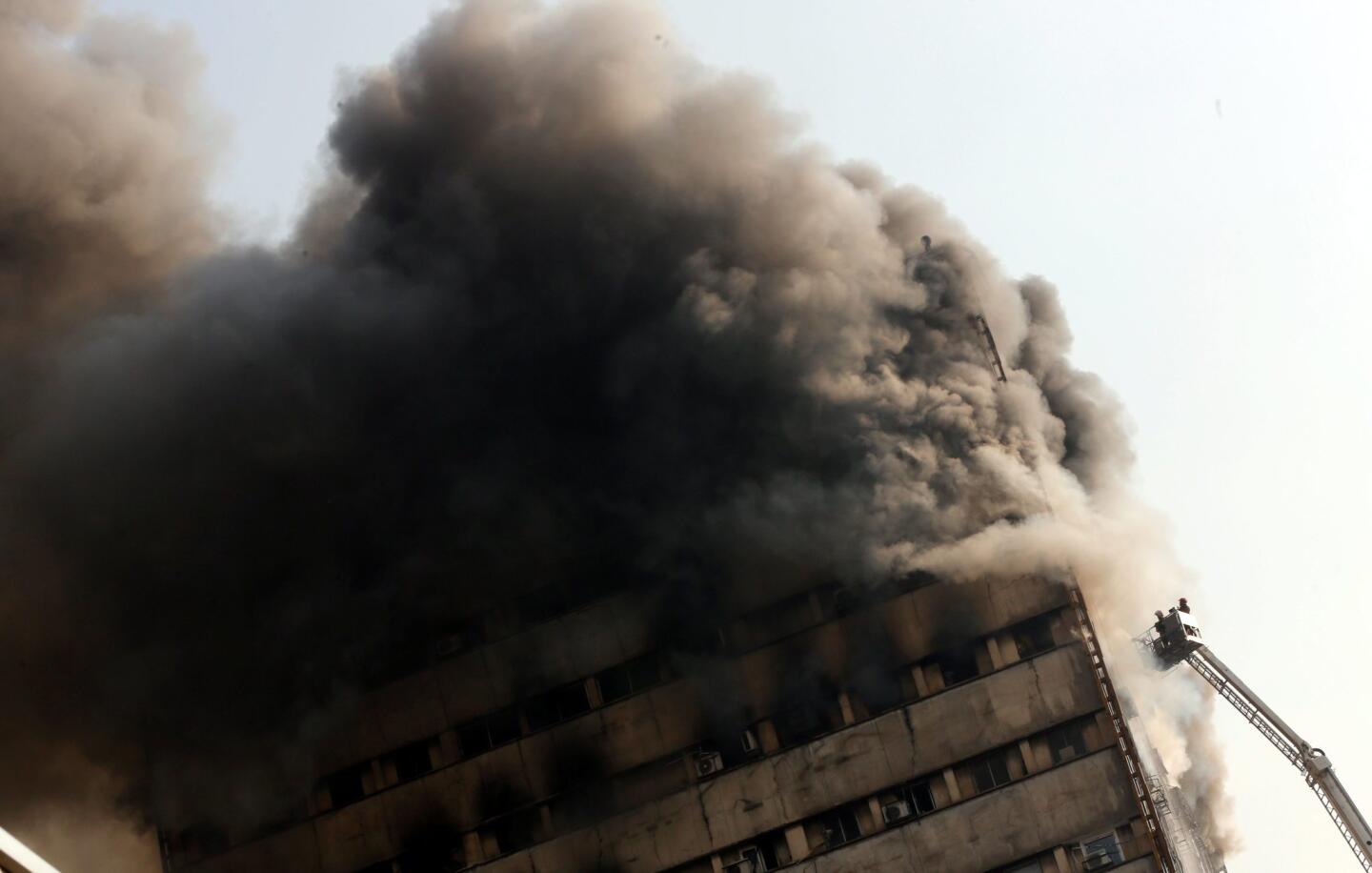 Plasco building burns, collapses in Tehran
