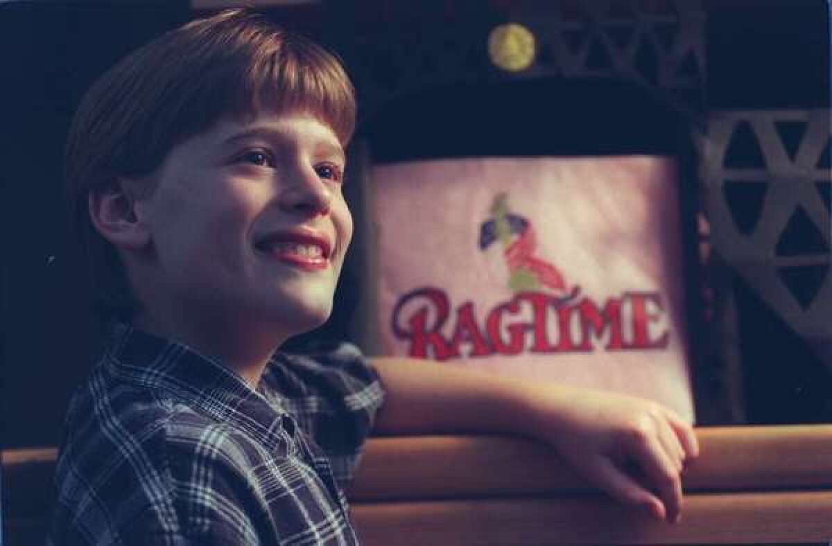 Blake McIver, formerly Blake McIver Ewing, is shown at age 12 in the Ragtime production of "The Little Boy."