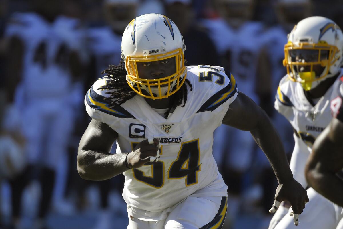Chargers defensive end Melvin Ingram runs a play against the Houston Texans.