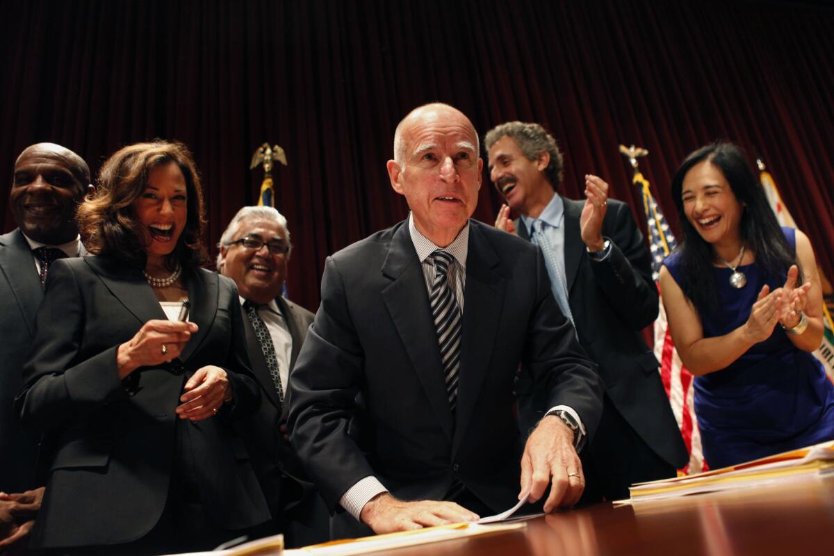 Kamala Harris with Governor Jerry Brown.