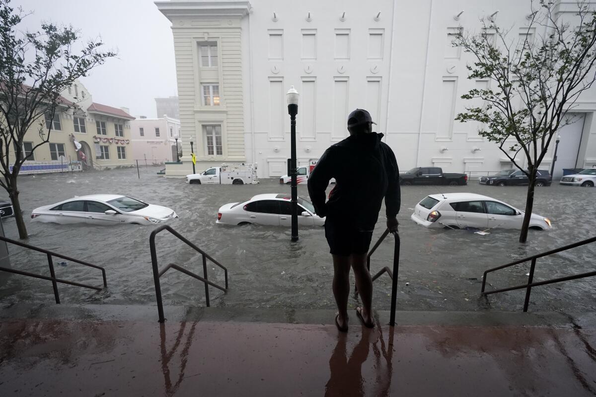 Floodwaters move on the street Wednesday in Pensacola, Fla. 