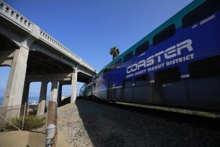 SAN DIEGO, CA - SEPTEMBER 16: A Coaster heads north under the North Torrey Pines Road Bridge in Del Mar on Thursday, Sept. 16, 2021. (K.C. Alfred / The San Diego Union-Tribune)