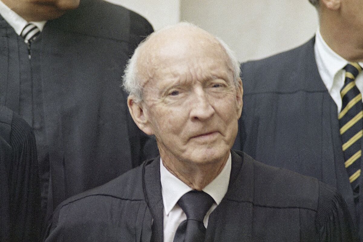FILE - Supreme Court Justice Hugo L. Black, poses for a photo on Oct. 9, 1970. Supreme Court justices have long prized confidentiality. It’s one of the reasons the leak of a draft opinion in a major abortion case last week was so shocking. But it’s not just the justices’ work on opinions that they understandably like to keep under wraps. The justices are also ultimately the gatekeepers to information about their travel, speaking engagements and health issues. (AP Photo/John Duricka, File)