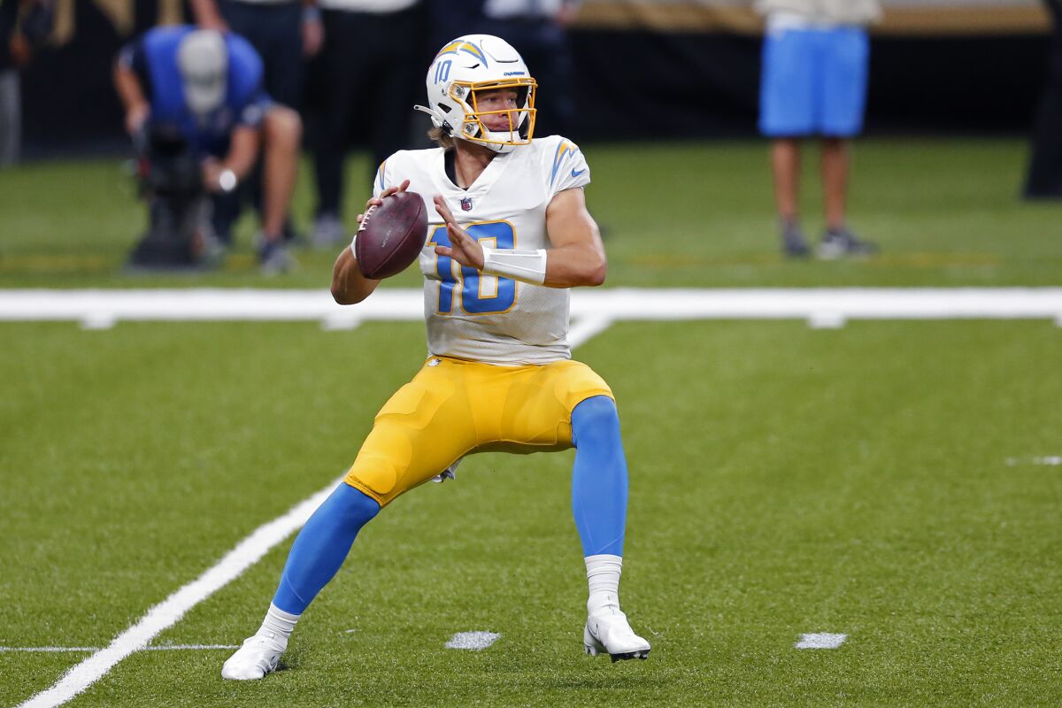 Chargers quarterback Justin Herbert looks to pass against the New Orleans Saints on Oct. 12, 2020. 