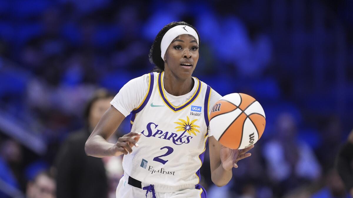 Thes Sparks' Rickea Jackson handles the ball during a WNBA basketball game.