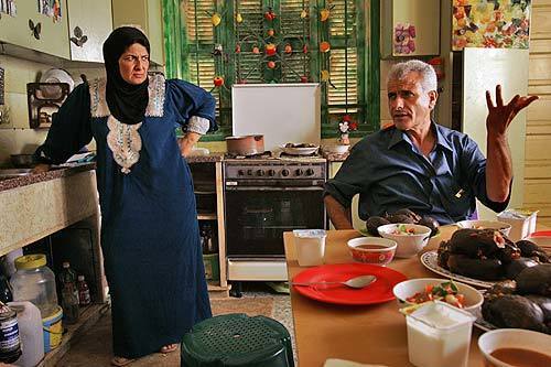 Khalil Bashir and his wife, Suad, are looking forward to the Israeli withdrawal from the Gaza Strip. This loss of theirs, the settlers, echoes what we have felt here for so long in Palestine, with the Israeli seizure of so much of our land, he says.