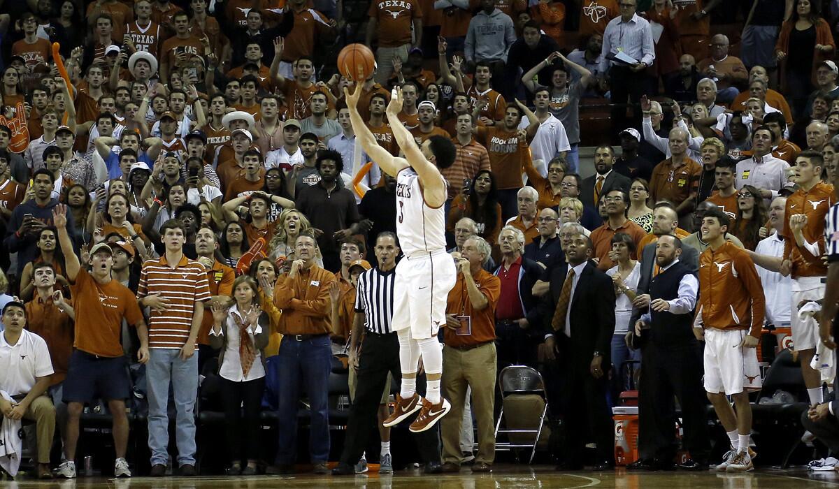 Texas' Javan Felix shoots a jump shot at the buzzer to beat the North Carolina on Saturday.