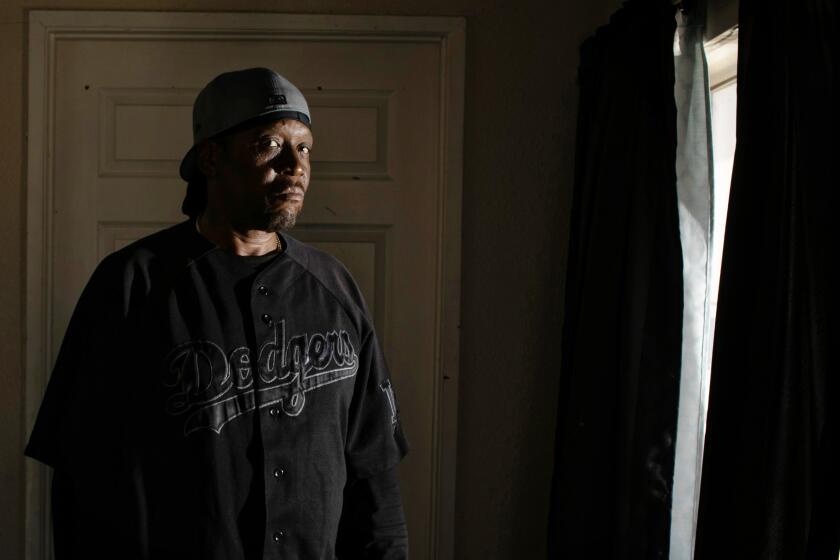 INGLEWOOD, CA - JULY 15: Leon Simmons poses for a portrait at his home on Friday, July 15, 2022 in Inglewood, CA. Simmons is among some 300 Black employees who will be compensated as a result of EEOC settlements with Cardinal Health and Ryder Logistics and Kimco Staffing over workplace discrimination. (Jason Armond / Los Angeles Times)