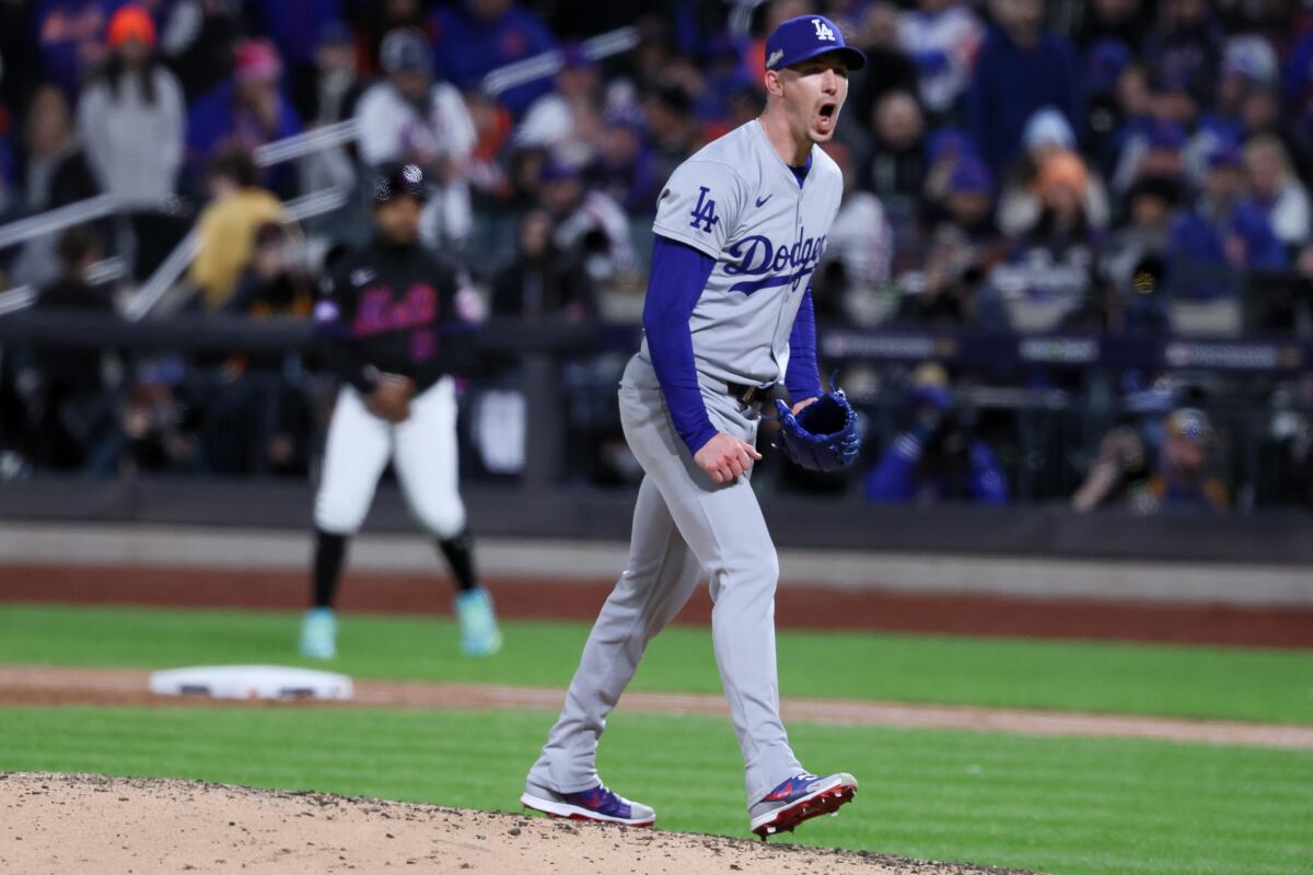 Dodgers pitcher Walker Buehler celebrates after striking out New York's Francisco Alvarez in the fourth inning.