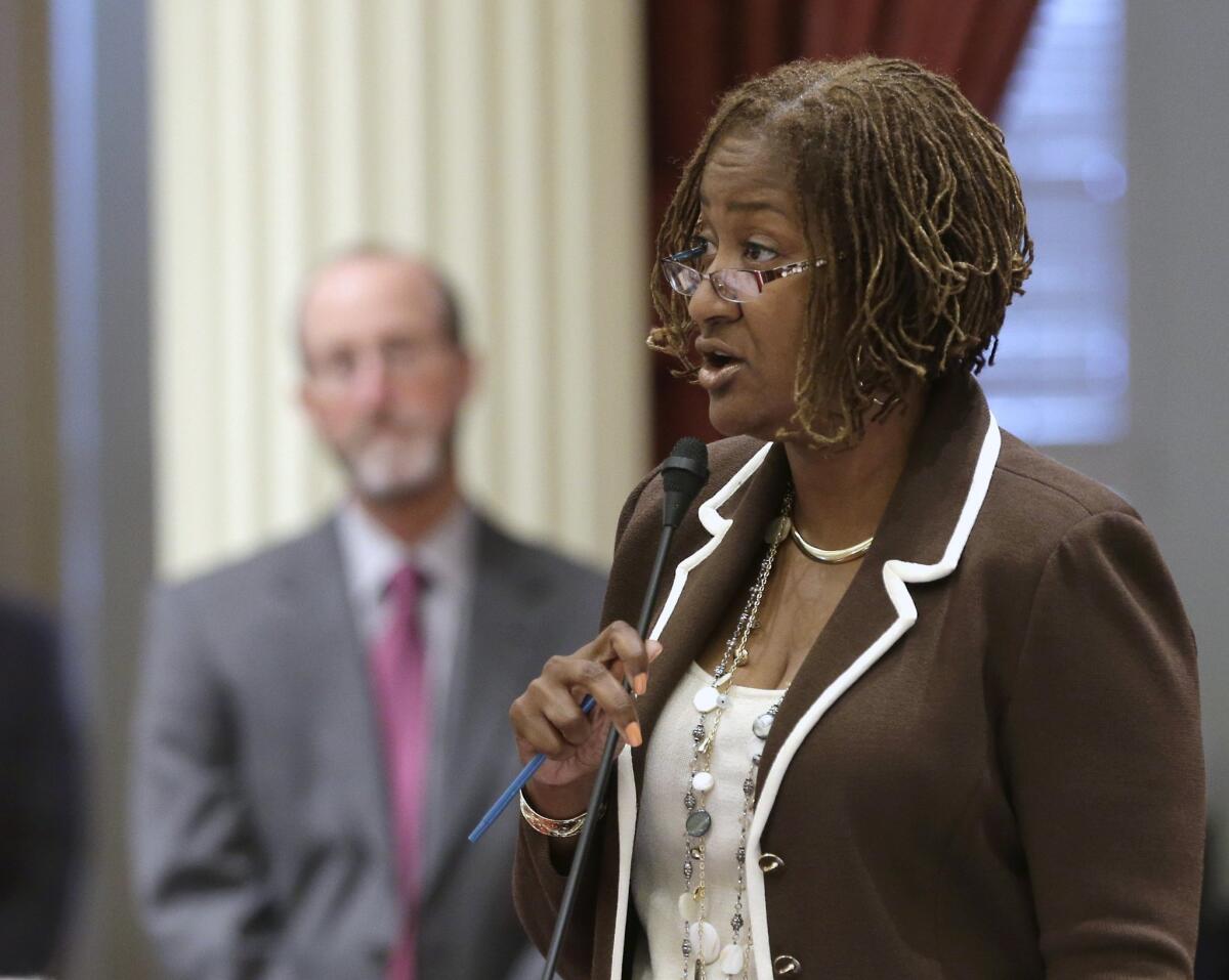State Sen. Holly Mitchell (D-Los Angeles) speaks during debate over the state budget in June. Mitchell's bill to strike references to lynching in the Callifornia penal code was signed by Gov. Jerry Brown on Thursday.
