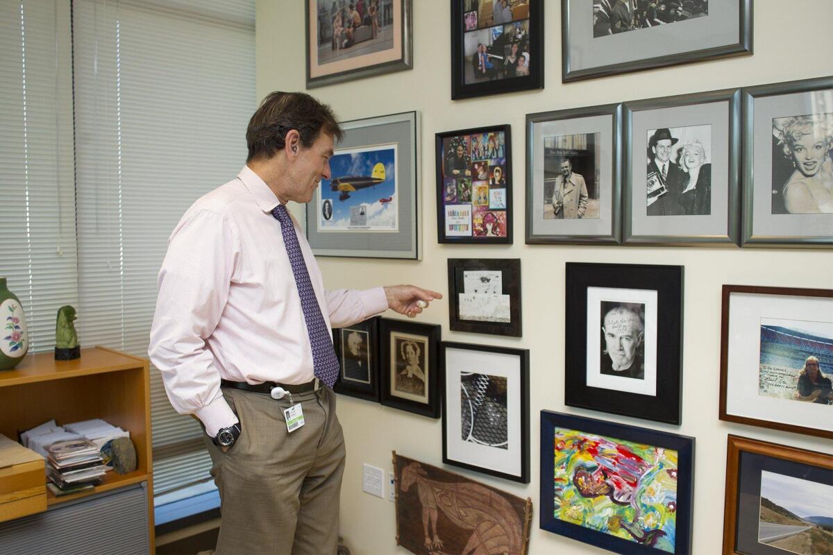 Dr. William Shankle’s office at Hoag Hospital in Newport Beach contains photos and artworks given to him as gifts by his patients.