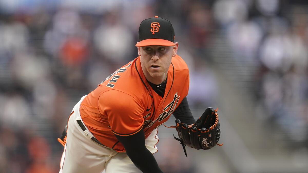 San Francisco Giants pitcher Anthony DeSclafani delivers against the Colorado Rockies.