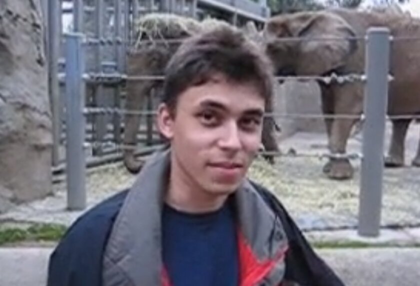 YouTube co-founder Jawed Karim stands in front of the elephant exhibit at the San Diego Zoo on April 23, 2005.