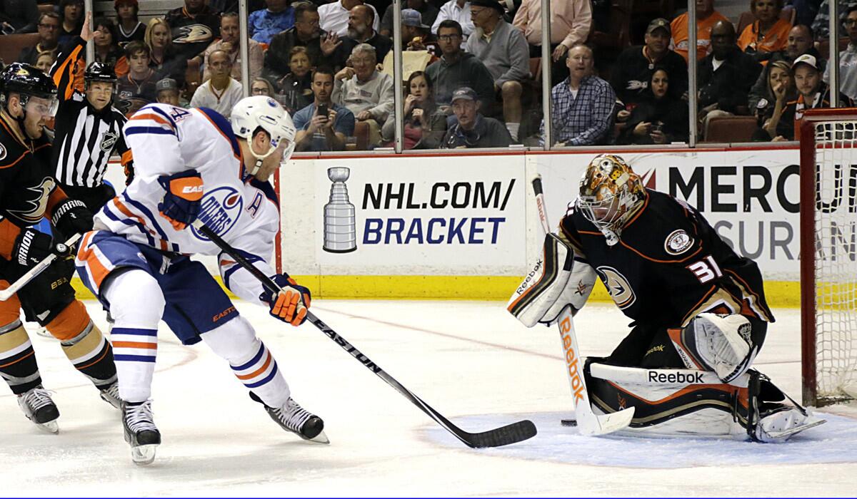 Ducks goalie Frederik Andersen saves a shot from Oilers' Taylor Hall during the Ducks' 5-1 win over the Oilers on April 1.