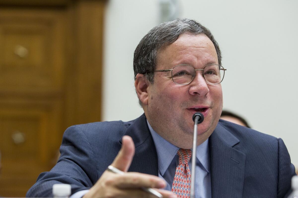 Comcast Executive Vice President David L. Cohen wrote Thursday in a blog post: "Comcast remains committed to a free and open Internet and [is] working with the FCC on appropriate rules for all players across the industry." He is pictured at a May 8 House Judiciary Committee hearing about the proposed Comcast-Time Warner Cable merger.