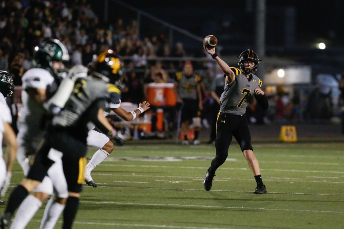 THOUSAND OAKS, CA - SEPTEMBER 16: Newbury Park quarterback Brady Smigiel (7) passes against Royal.