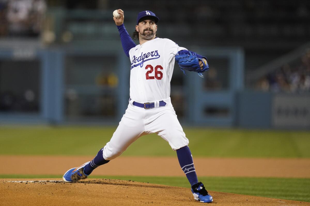 Los Angeles Dodgers starting pitcher Tony Gonsolin (26) throws during the first inning.