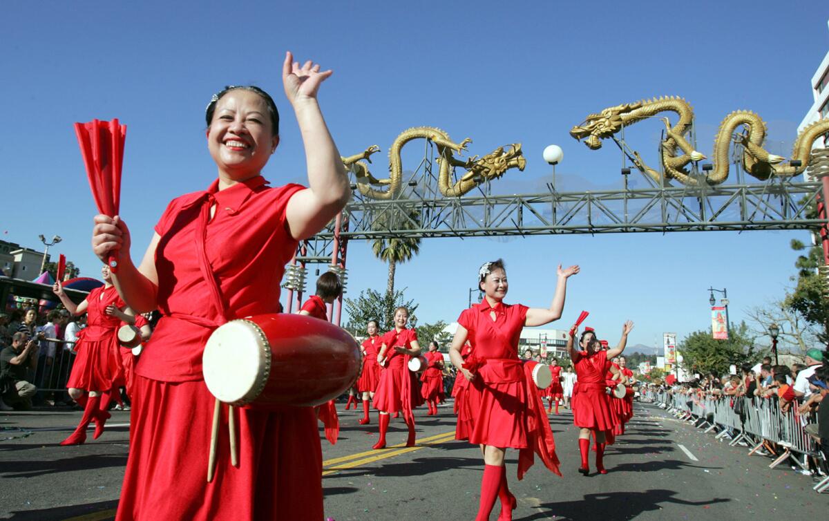 Members of the Chinese American Culture Assn. marched during the Golden Dragon Parade in Chinatown in 2008.