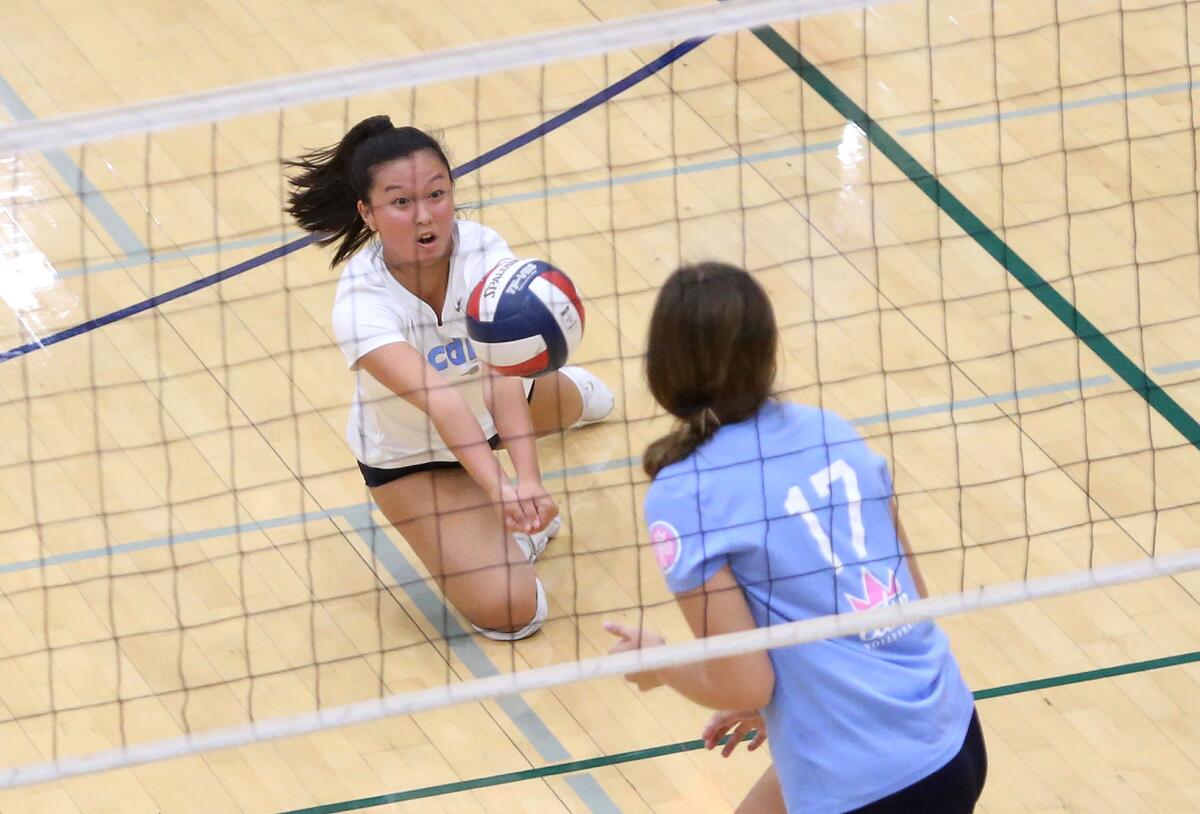 Corona del Mar's Michelle Won drops down and digs a ball in the quarterfinals of the CIF State Southern California Regional Division I playoffs at La Costa Canyon on Thursday.