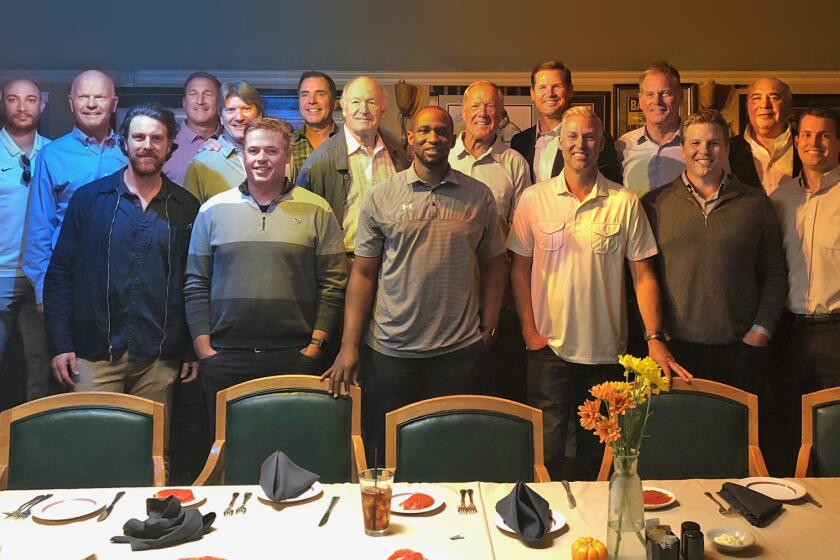 Sixteen former UCLA quarterbacks gathered to honor former Bruins coach Tom Donohue at a luncheon in 2018.