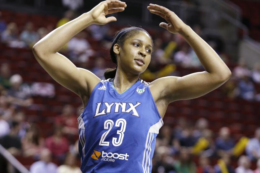 Minnesota Lynx's Maya Moore in action against the Seattle Storm in the first half of a WNBA basketball game, Sept. 10, 2013, in Seattle. Moore has officially decided to retire from playing basketball, making her announcement on “Good Morning America” on Monday, Jan. 16, 2023. (AP Photo/Elaine Thompson)