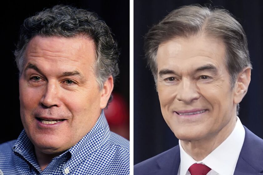 FILE - Pennsylvania Republican Senate candidates David McCormick, left, and Mehmet Oz during campaign appearances in May 2022 in Pennsylvania. (AP Photo/File)