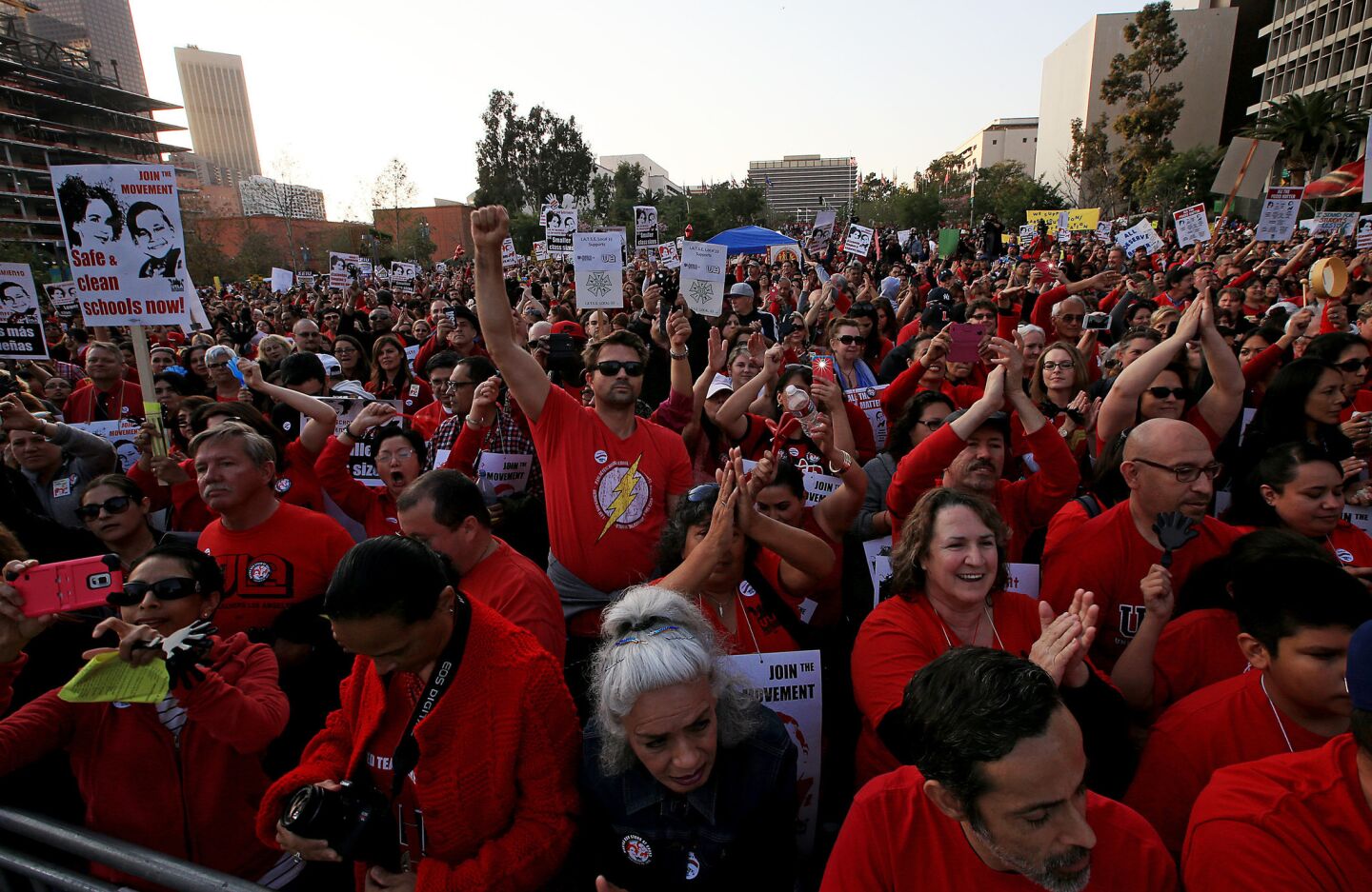 Thousands of teachers belonging to the United Teachers of Los Angeles union rally in Grand Park.