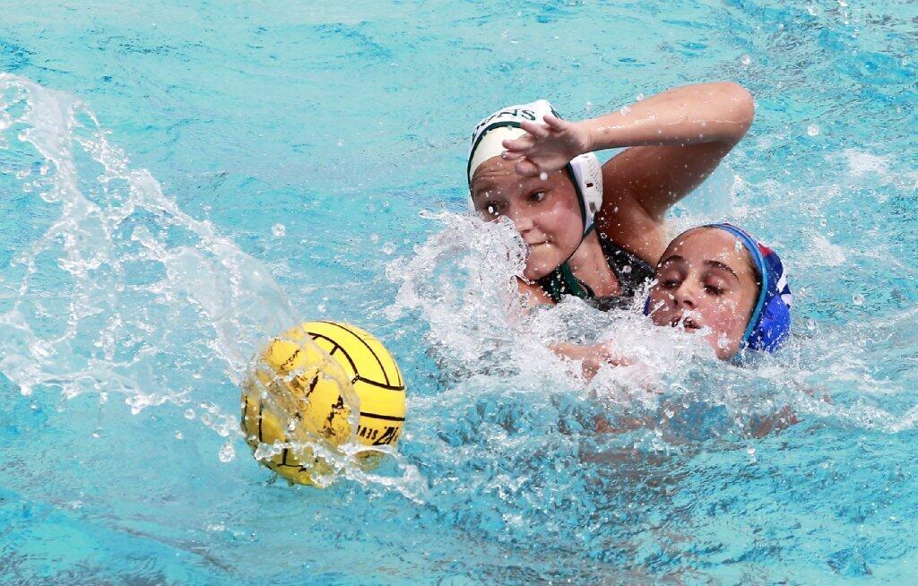 Corona del Mar High's Maddie Musselman battles Santa Barbara's Jessica Gaffney in the quarterfinals of the CIF Southern Section Division 1 playoffs at CdM on Saturday.