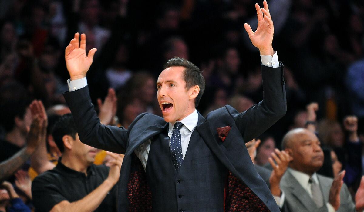Steve Nash, celebrating a Lakers basket while injured last season, was a two-time MVP with the Phoenix Suns before two injury-riddled seasons in L.A.