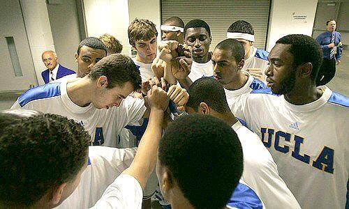 The UCLA basketball team unites before a game with Pittsburgh in the 3rd round of the NCAA Tournament in San Jose.
