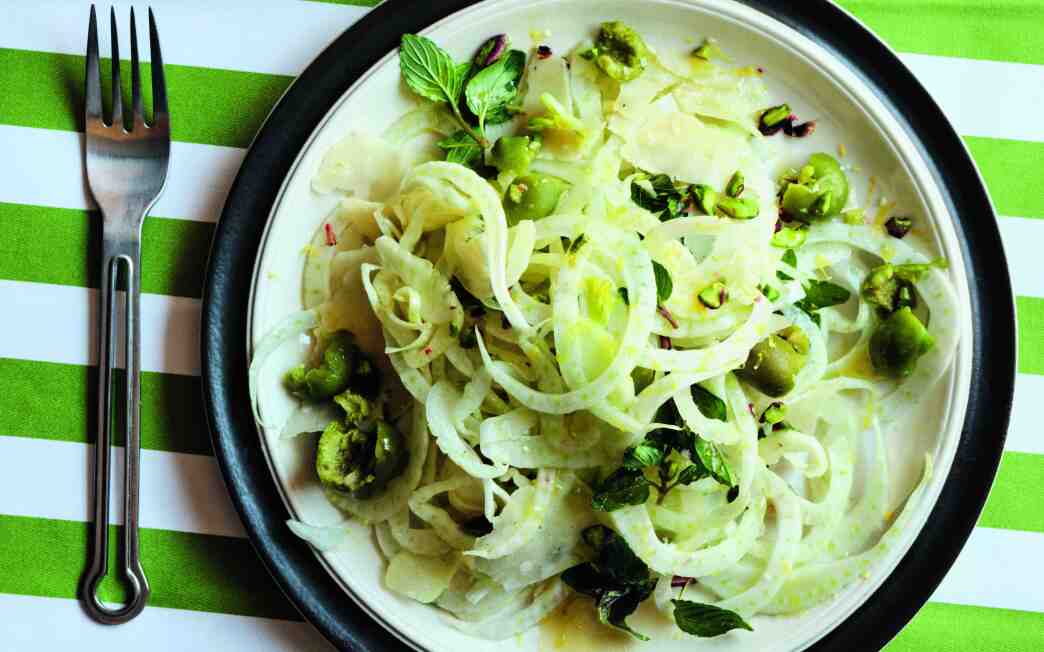 Spiced fatty green olives add richness to a briny, crisp shaved fennel salad.