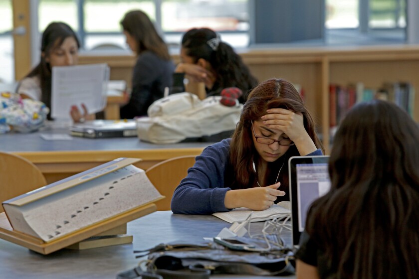Student study in the library at El Camino College's Compton Center.
