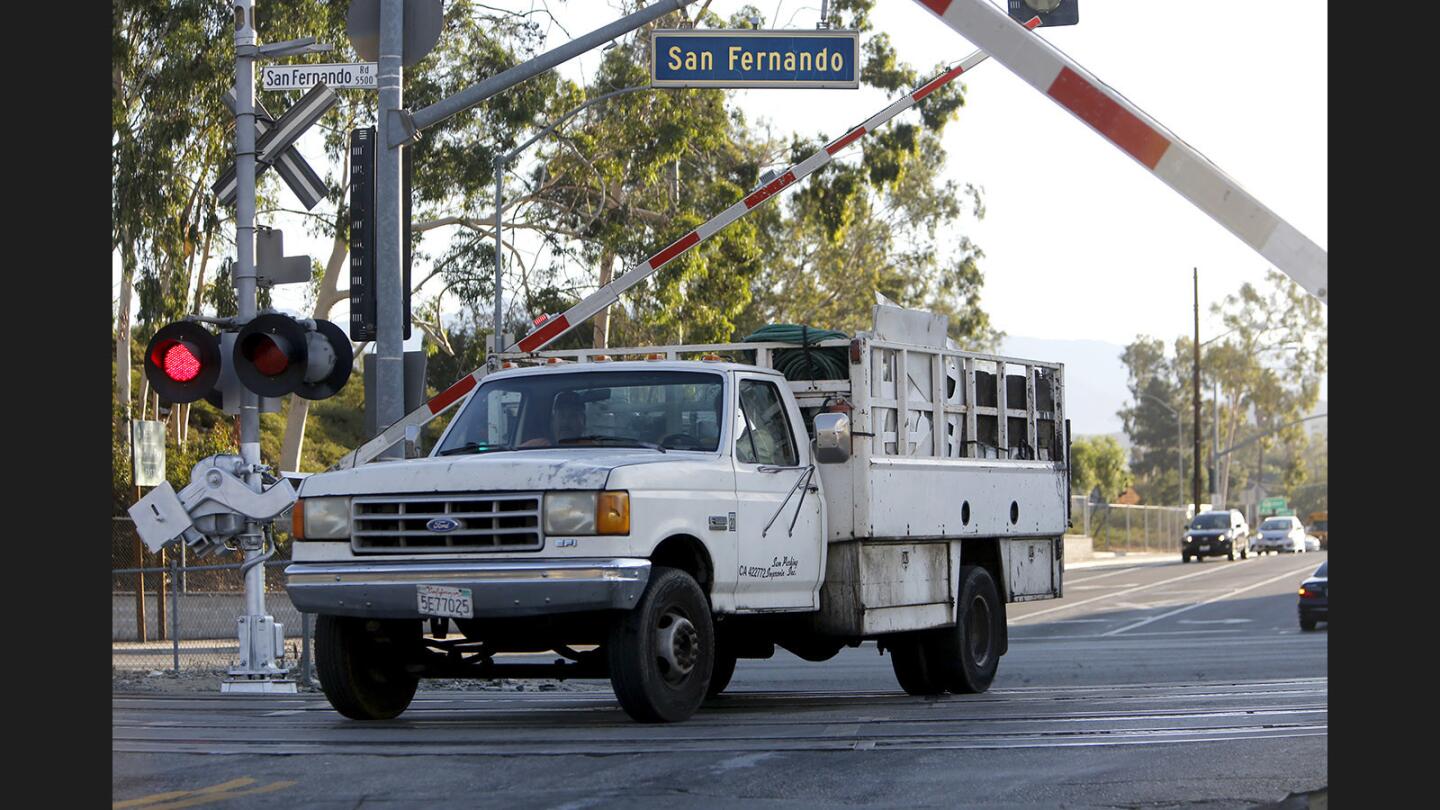 While officers waited near this location during "Operation Clear Track," a truck sped up to get past the railroad crossing arms before they dropped as a Metrolink train approached during its morning commute at Doran Street and San Fernando Rd. in Glendale/Los Angeles on Tuesday, Sept. 26, 2017. A press conference for Rail Safety Month was being held nearby. The driver, who did not want to give his name, was given a ticket by an L.A. County Sheriff deputy who was stationed nearby.