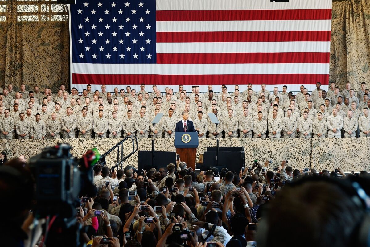 President Obama addressed troops at the Camp Pendleton Marine Corps base Wednesday, shortly after the White House announced he was scrapping a planned summit with Russian President Vladimir Putin. Relations between the former superpowers have been in a downward spiral since Putin's return to the Russian presidency last year.