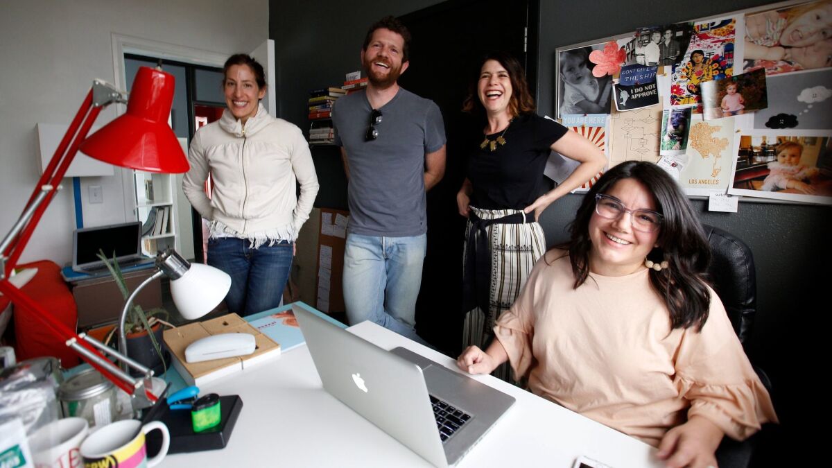 Janelle Brown, second from right, shares the Silver Lake writing space Suite 8 with, from left, Erica Rothschild, Joshua Seumer and Carina Chocano. (Kirk McKoy / Los Angeles Times)